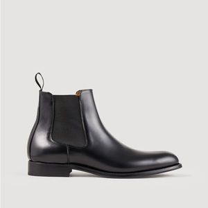 Smooth leather Chelsea ankle boots with elastic on the sides and a leather sole.